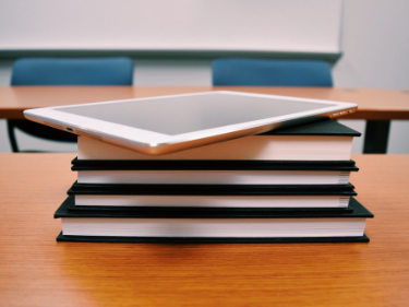 Resources image: books and ipad