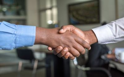 Image of people shaking hands