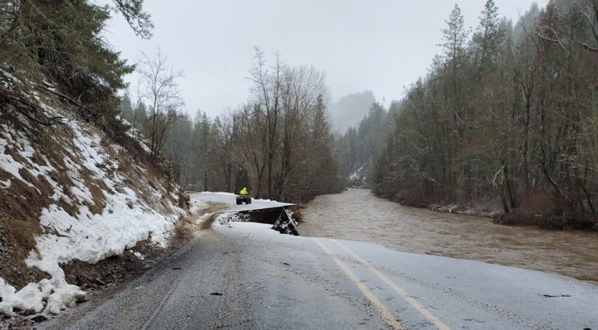 Flood water rising on a highway